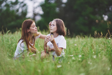 mother and daughter having fun in the park