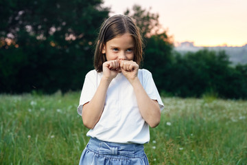 Fototapeta premium little girl with mobile phone