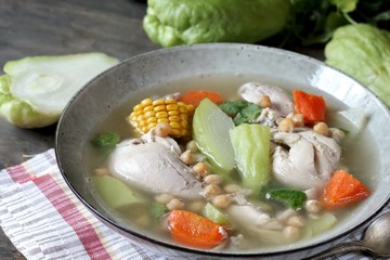 soup with chayote and chicken, corn, carrots and chickpeas. Latin American cuisine. dish with chayote. 
