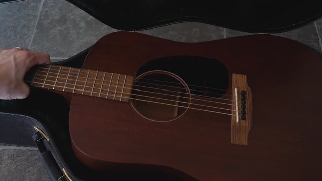 Puting A Acoustic Guitar Back In A Guitar Case