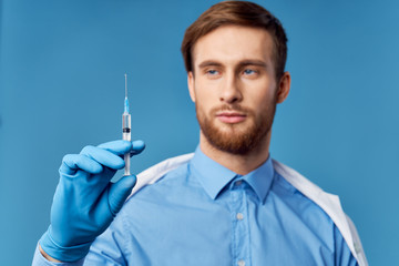 young doctor with syringe