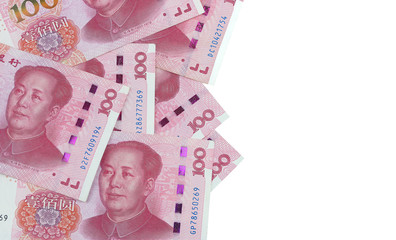 Top view of chinese banknote spread on white background with copy space..