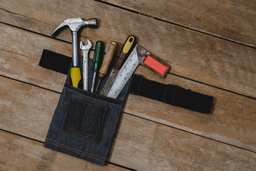 old instruments constructor or renovation for build and repair house on wooden background