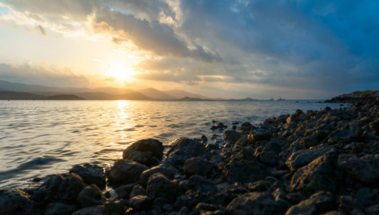 Fototapeta na wymiar Rock coastline on sunset in Samui island, Suratthani, Thailand 