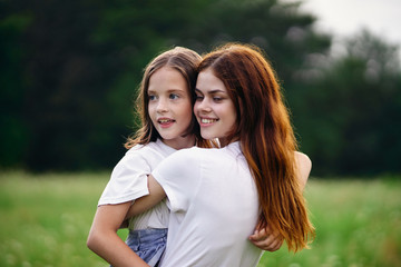 Fototapeta premium mother and daughter in the park