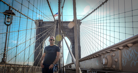 Fototapeta na wymiar Man On the Bridge in New York 