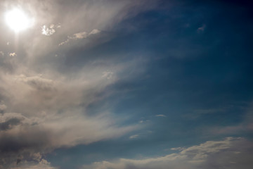Beautiful sunset. Sun rays paint the clouds