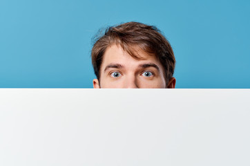 young man with blank banner