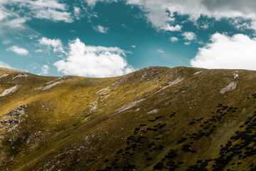 Detail of mountain ridge with blue sky
