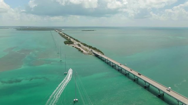 Aerial: Traffic on a bridge at Matecumbe Key near Key West in the Florida Keys. Florida, USA