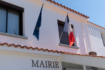 Europe Union EU and French flag on city hall in Noirmoutier Island