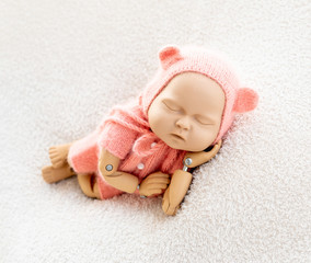 Mannequin of newborn for photo posing