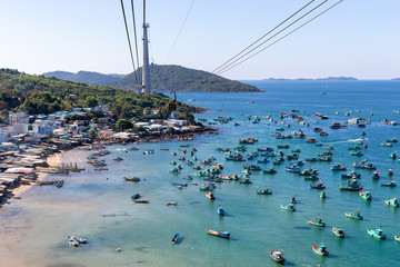 Sun world hon thom travelling above blue vietnam sea and boats in Vietnam, Phu Quoc 2019