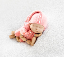 Mannequin of newborn for photo posing