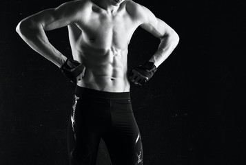 Fototapeta na wymiar muscular man posing in studio
