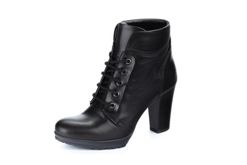 Female autumn-winter leather ankle  boots isolated on white background