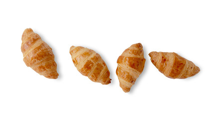 Fresh croissants isolated on white background. Top view.