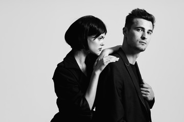 portrait of man and woman on white background