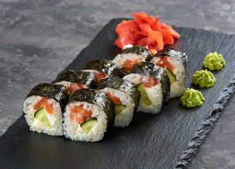 Sushi rolls with salmon and cucumber