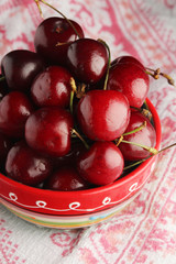 A bowl with ripe cherry