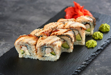 Maki Sushi pieces collection with Salmon Roe, Smoked Eel, Cucumber, Cream Cheese, Sesame, Avocado