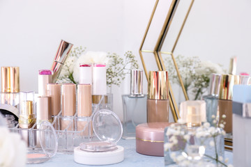 Makeup cosmetics on dressing table