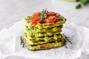 Tasty squash waffles on parchment, closeup