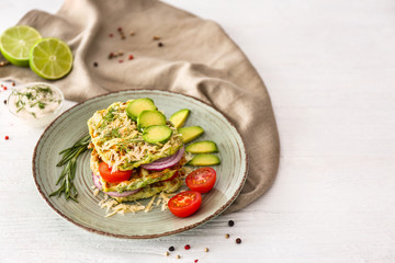 Plate with tasty squash waffles on white table