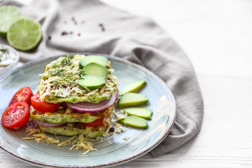 Plate with tasty squash waffles on white table