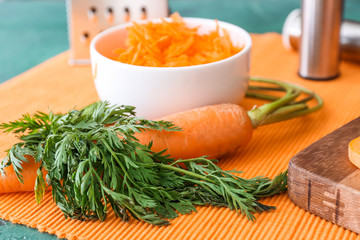 Tasty fresh carrot on table, closeup