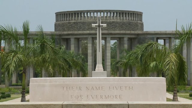 Medium low-angle still shot of Taukkyan War Cemetery Monument , Rangoon Memorial, Myanmar