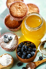 delicious mouthwatering dessert made of muffins, honey and blueberry