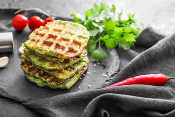 Tasty squash waffles on slate plate