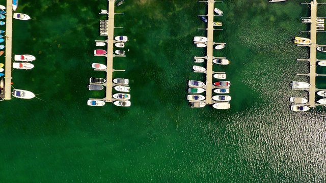 Ariel overhead shot of boats at the dock on a sunny day