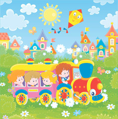 Happy little children playing in a colorful toy train on a playground in a summer park of a small town on a sunny day, vector illustration in a cartoon style