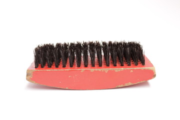 red washing brush on isolated background