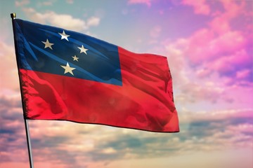 Fluttering Samoa flag on colorful cloudy sky background. Prosperity concept.