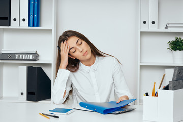 female doctor talking on phone in office