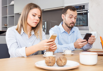 Couple with phones