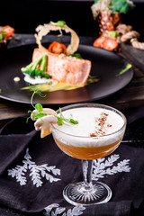 yellow cocktail decorated with mushroom