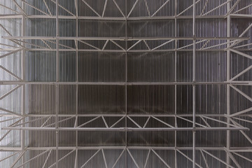 Industrial ceiling with profiled sheet and girder beam system flat background.