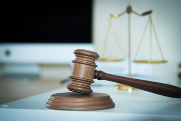 Lawyer businessman working or reading lawbook in office workplace for consultant lawyer concept.