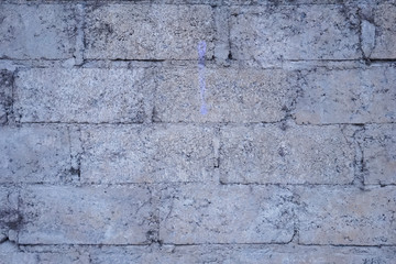 Abstract weathered textured white brick wall background