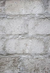 Abstract weathered textured white brick wall background