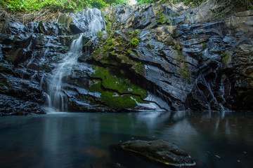 Ton Aow Yon Waterfall rich natural resources,in the forest,asia tropical areaat Island Phuket Thailand.