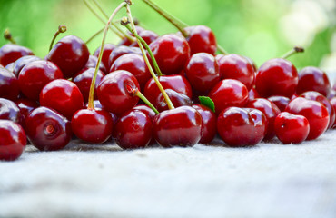 Closeup of a bunch of wet ripe cherry farm.