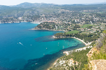 Fototapeta na wymiar View of Cassis town, Cap Canaille rock and Mediterranean Sea from Route des Cretes mountain road, Provence, France