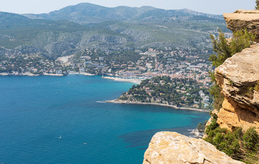 Fototapeta na wymiar View of Cassis town, Cap Canaille rock and Mediterranean Sea from Route des Cretes mountain road, Provence, France