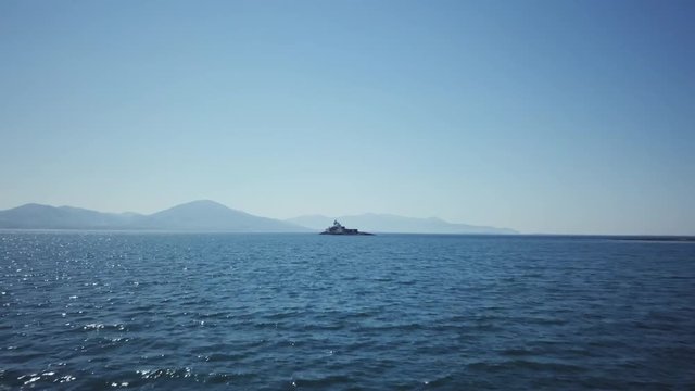 fast dolly in shot approaching Fenit Lighthouse ( The Wild Place) , County Kerry, Ireland