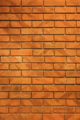 Fototapeta premium brick wall of red color, wide panorama of masonry